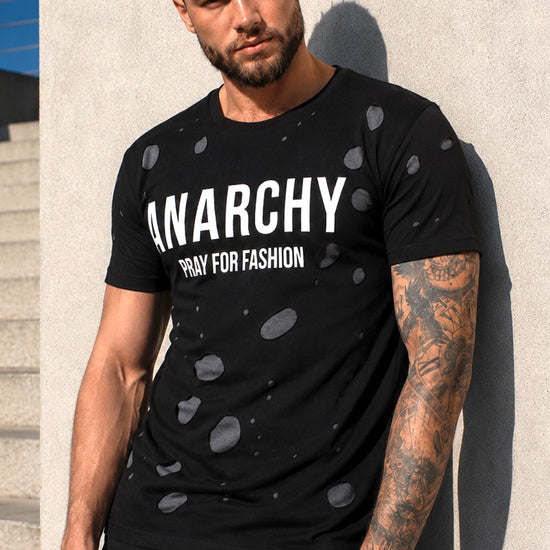 Men’s black ANARCHY designer T-shirt by KRUTYAKOV with white graphic print and cut-out details
