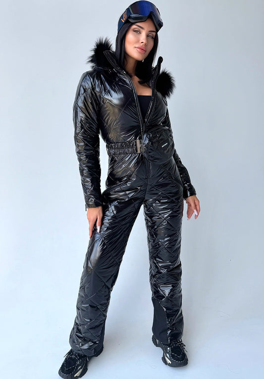 Women’s black glossy one piece ski suit with fur hood by KRUTYAKOV