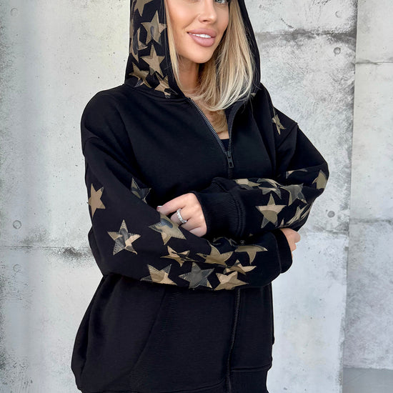 Women’s black star patch hoodie by KRUTYAKOV, main front view