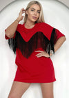 Women’s red fringe T-shirt outfit styled with black boots and sunglasses for a bold city streetwear look