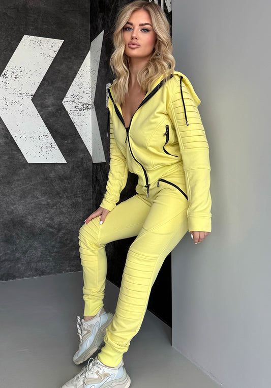 KRUTYAKOV Relief Yellow women’s knit tracksuit with bright statement color, zip hoodie, joggers, and modern streetwear look