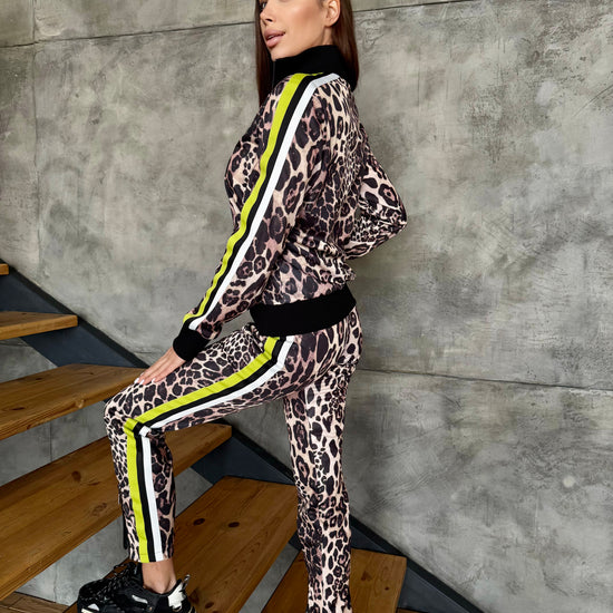 Luxury leopard tracksuit set for women with fitted jacket, jogger pants, and soft fleece lining