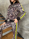KRUTYAKOV women’s leopard print two piece tracksuit styled as a bold sporty chic streetwear outfit