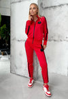 Handmade red two piece tracksuit for women with sleek athletic fit and premium designer streetwear look