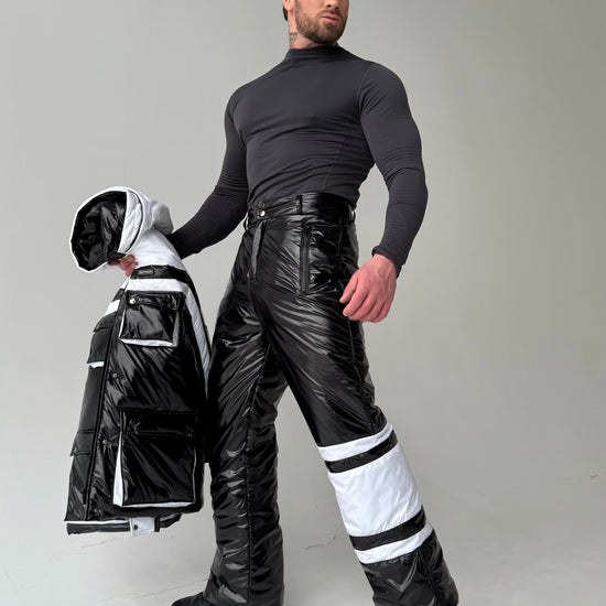Men’s insulated snowboarding suit with black ski jacket and pants