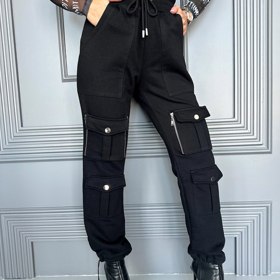 Black cotton cargo jogger pants for women styled with a modern utility-inspired designer look