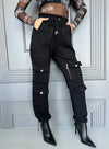 Black cotton cargo jogger pants for women styled with a modern utility-inspired designer look