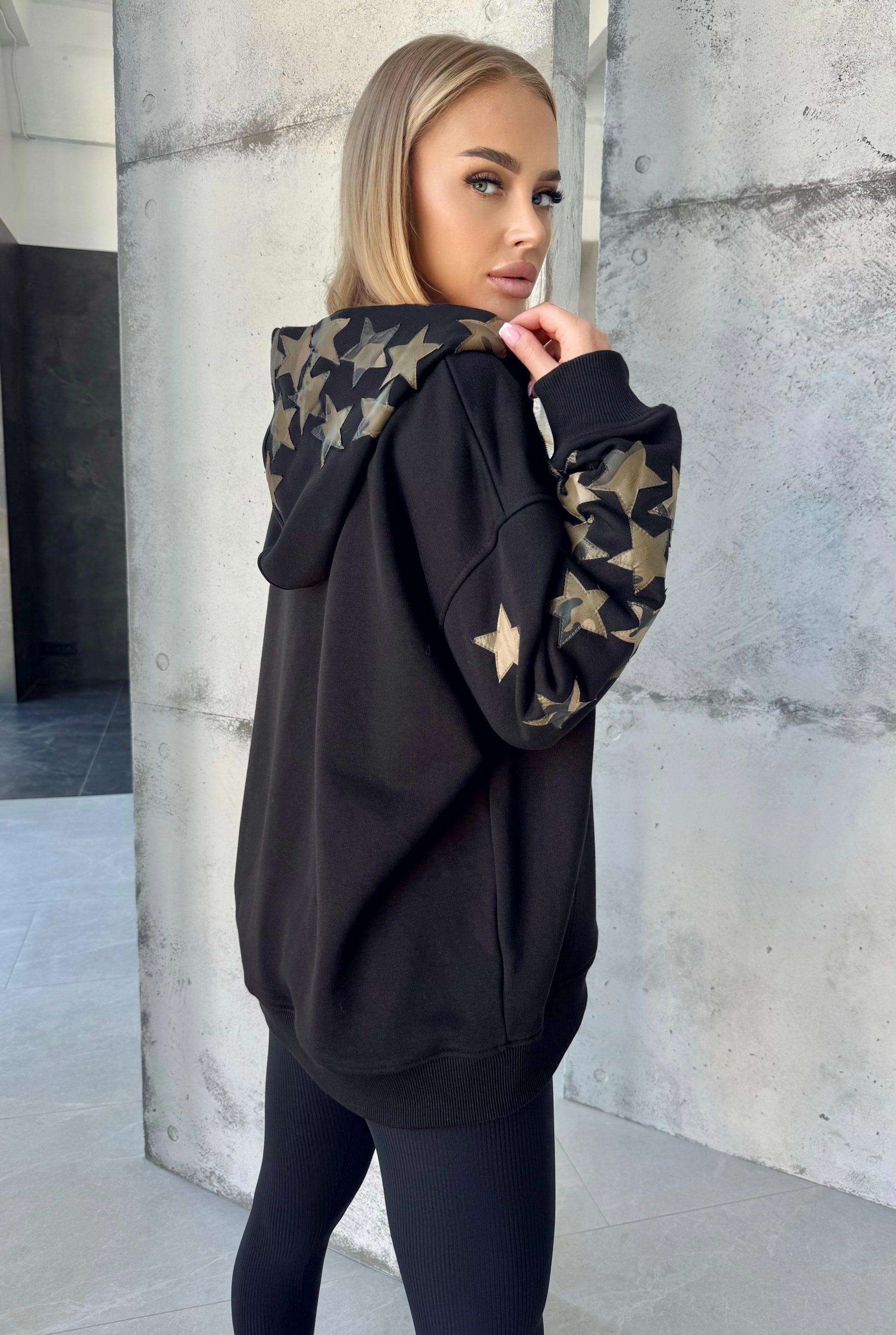 Handmade KRUTYAKOV black hoodie with star details on sleeves and hood