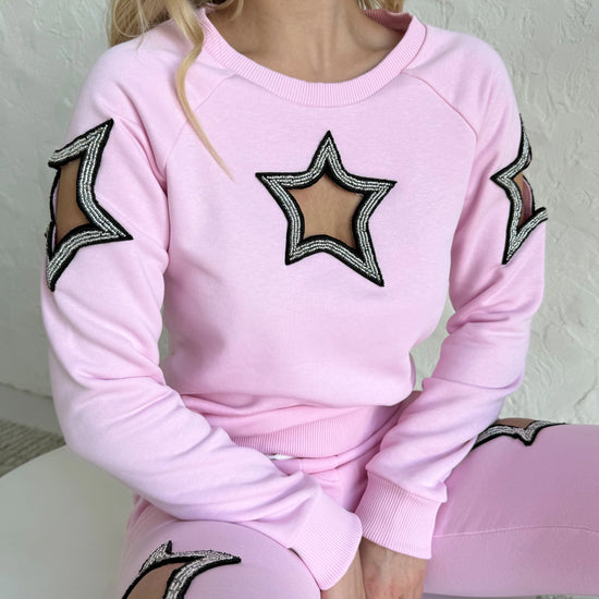 Pink women’s two-piece tracksuit with handmade beaded star embroidery by KRUTYAKOV