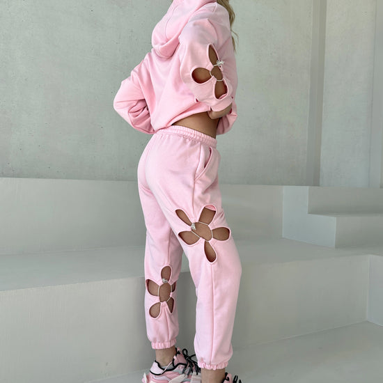 KRUTYAKOV women’s flower detail tracksuit in Daisy Pink with sporty chic look and comfortable jogger silhouette