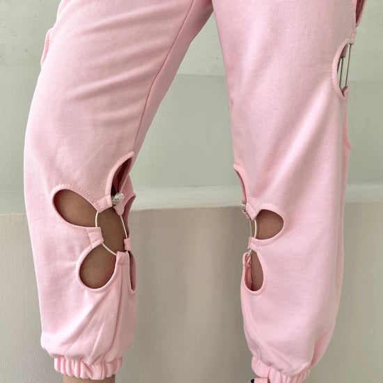 Soft cotton-blend pink tracksuit for women with relaxed fit, breathable fabric, and clean minimalist streetwear style