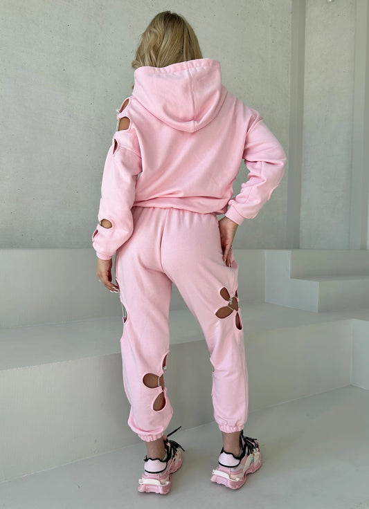 KRUTYAKOV Daisy Pink women’s tracksuit with floral cut-out detail, pastel color, and relaxed modern fit