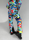Lifestyle photo of women’s multicolored ski suit for mountain trips, winter vacations, and après-ski fashion