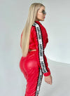 Women’s designer glossy red tracksuit set for fashion photoshoots, streetwear outfits, and everyday styling