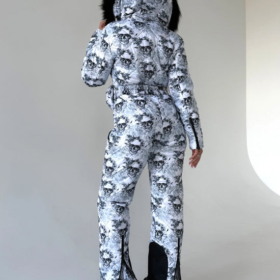 KRUTYAKOV women’s ski overall with artistic skull print, warm insulation, and statement après-ski style