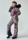 Women’s one piece snow suit VALE with insulated winter design, feminine fit, and bold pink camouflage pattern