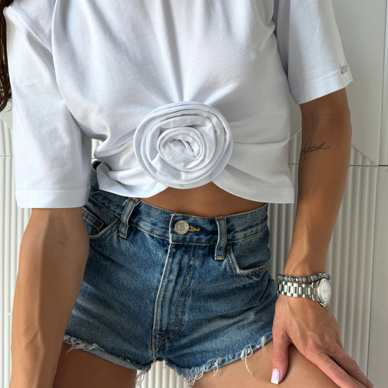 White women’s ROSETTE t-shirt with sculptural floral detail and modern cropped silhouette