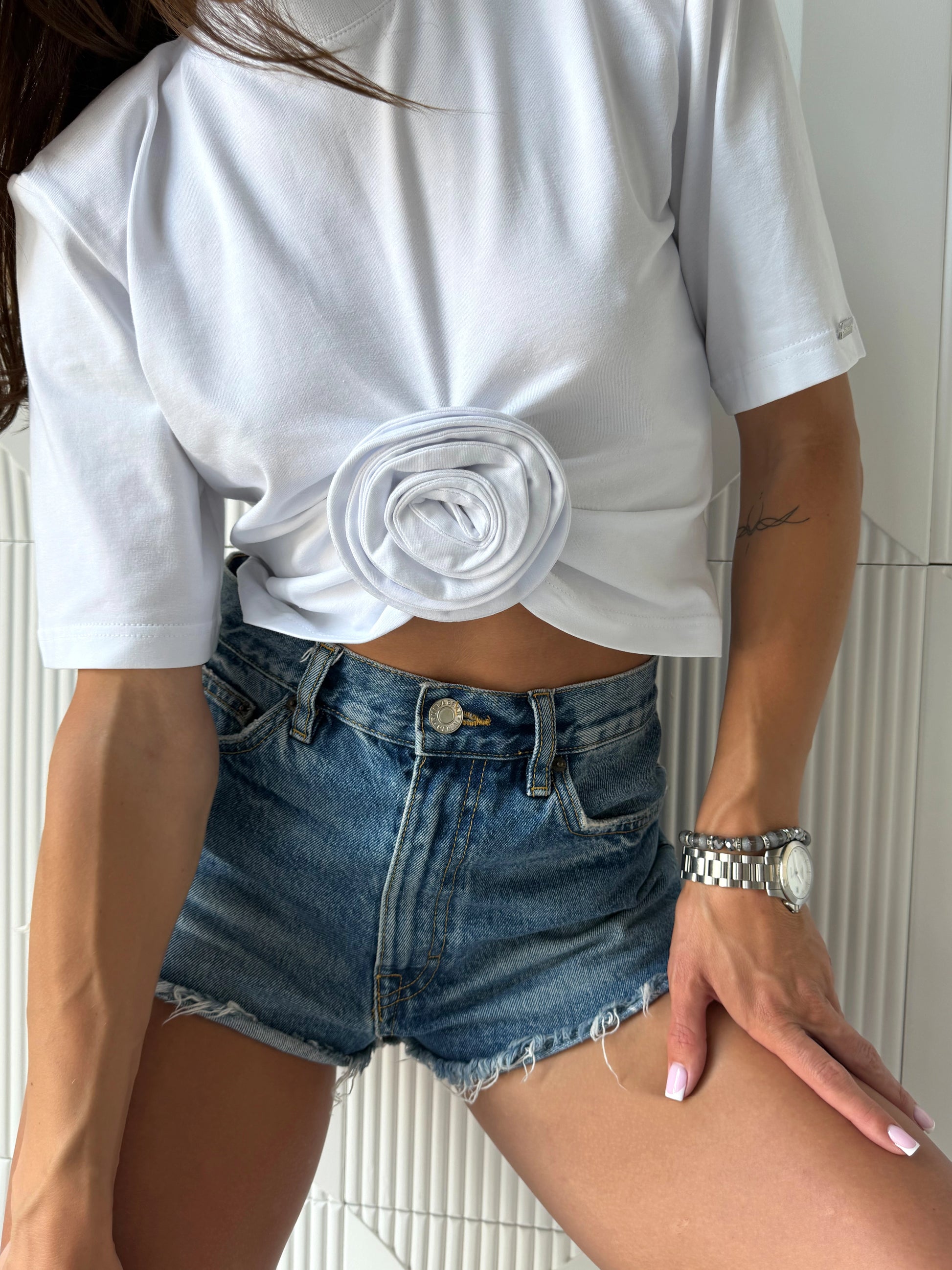 White women’s ROSETTE t-shirt with sculptural floral detail and modern cropped silhouette