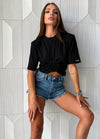 KRUTYAKOV ROSETTE black cotton t-shirt for women with feminine rose detail and modern cropped silhouette