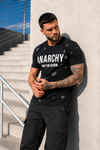 Front view of men’s black designer T-shirt with ANARCHY and PRAY FOR FASHION print