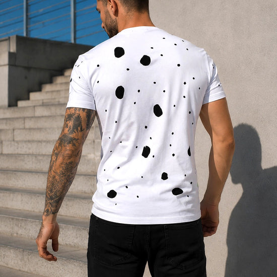 Men’s white graphic tee with bold ANARCHY print, short sleeves, and urban streetwear styling