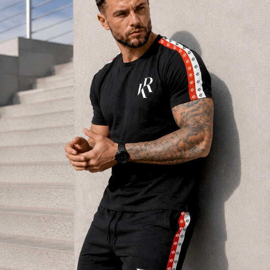 Men’s black two piece summer set NIZZA by KRUTYAKOV with cotton t-shirt, matching shorts and bold red and white side stripe details