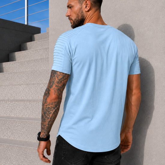 Back view of men’s light blue KRUTYAKOV T-shirt with asymmetric hem and premium casual fit