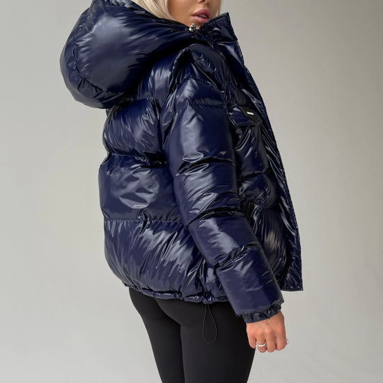 Designer women’s blue winter outerwear jacket with adjustable hood and hem