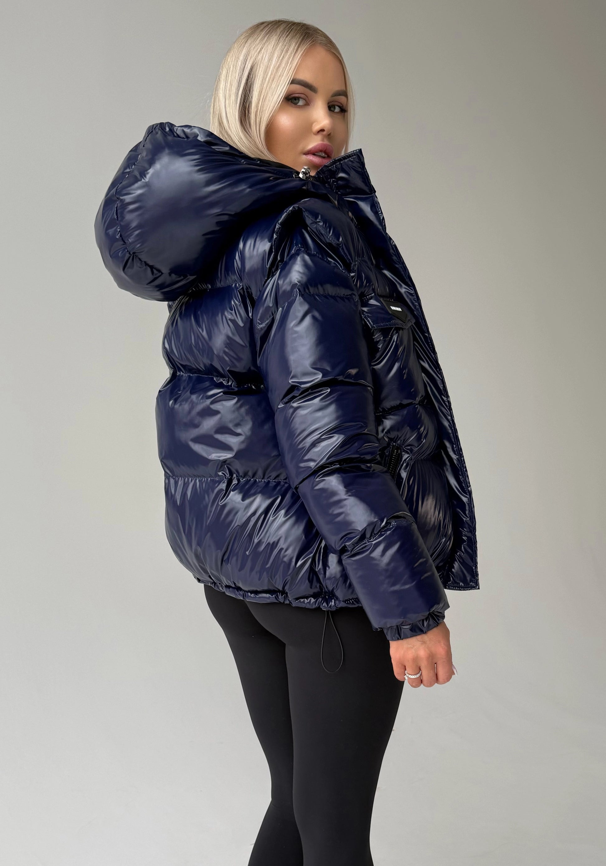 Designer women’s blue winter outerwear jacket with adjustable hood and hem