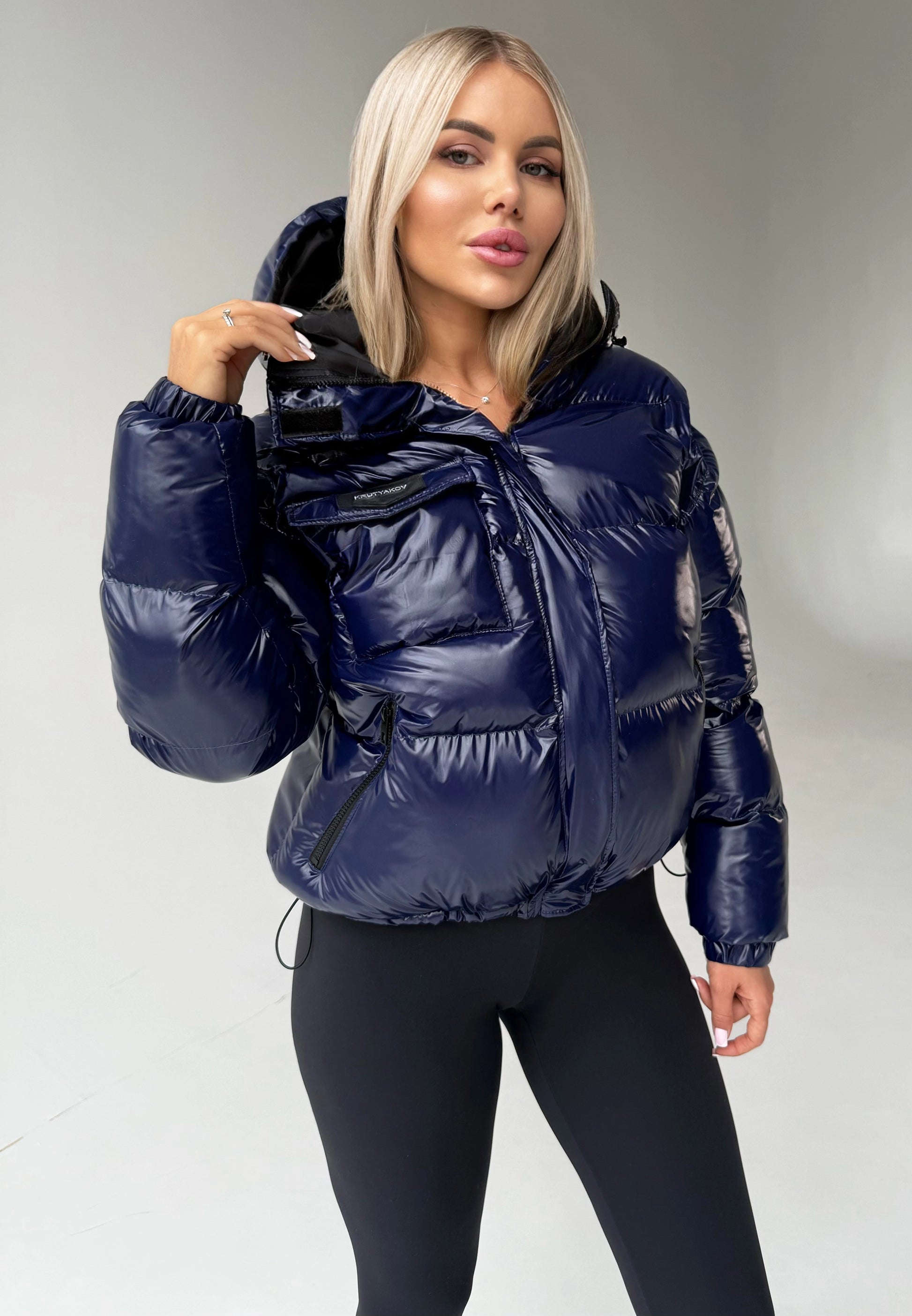 Short blue puffer jacket for women styled for cold weather and city wear