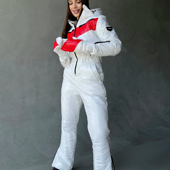 White and red women’s ski jumpsuit with matching insulated mittens