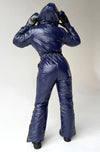 Dark blue one piece ski suit with glossy weather-resistant fabric, warm insulation, and fitted shape