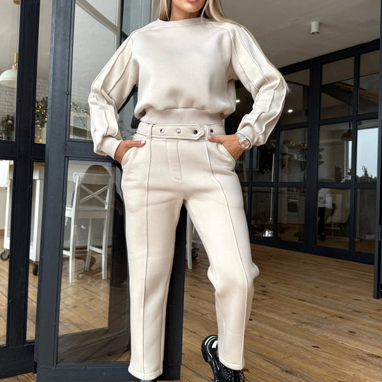 Women’s beige matching set with comfortable sweatshirt and elegant straight-leg pants