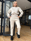 Women’s beige matching set with comfortable sweatshirt and elegant straight-leg pants