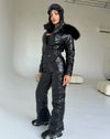 KRUTYAKOV women’s black glossy ski suit with zippered front and fur hood