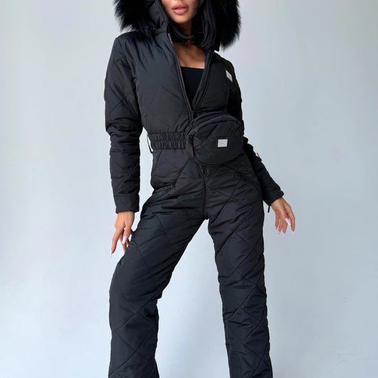 Women’s black winter ski jumpsuit with fitted waist and fur hood