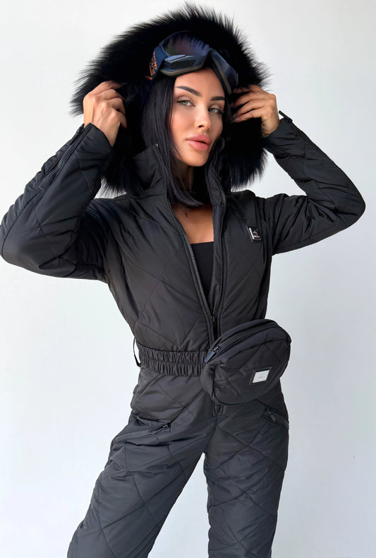 Black matte women’s ski jumpsuit with fur-trimmed hood by KRUTYAKOV