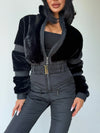 Women’s black insulated winter jumpsuit with eco fur trim and fitted waist
