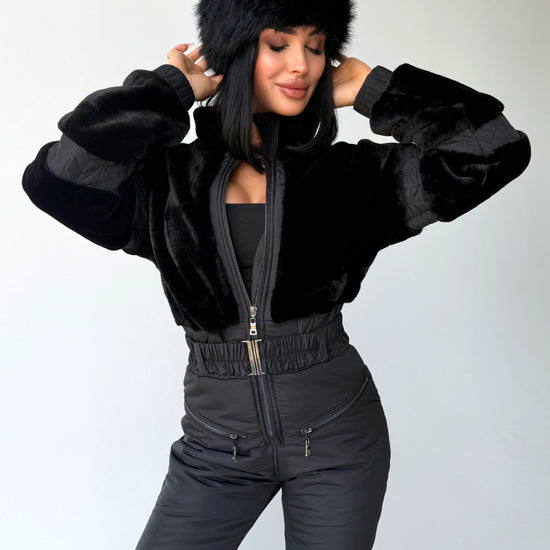 Women’s black winter jumpsuit close-up with Black Rabbit eco fur trim