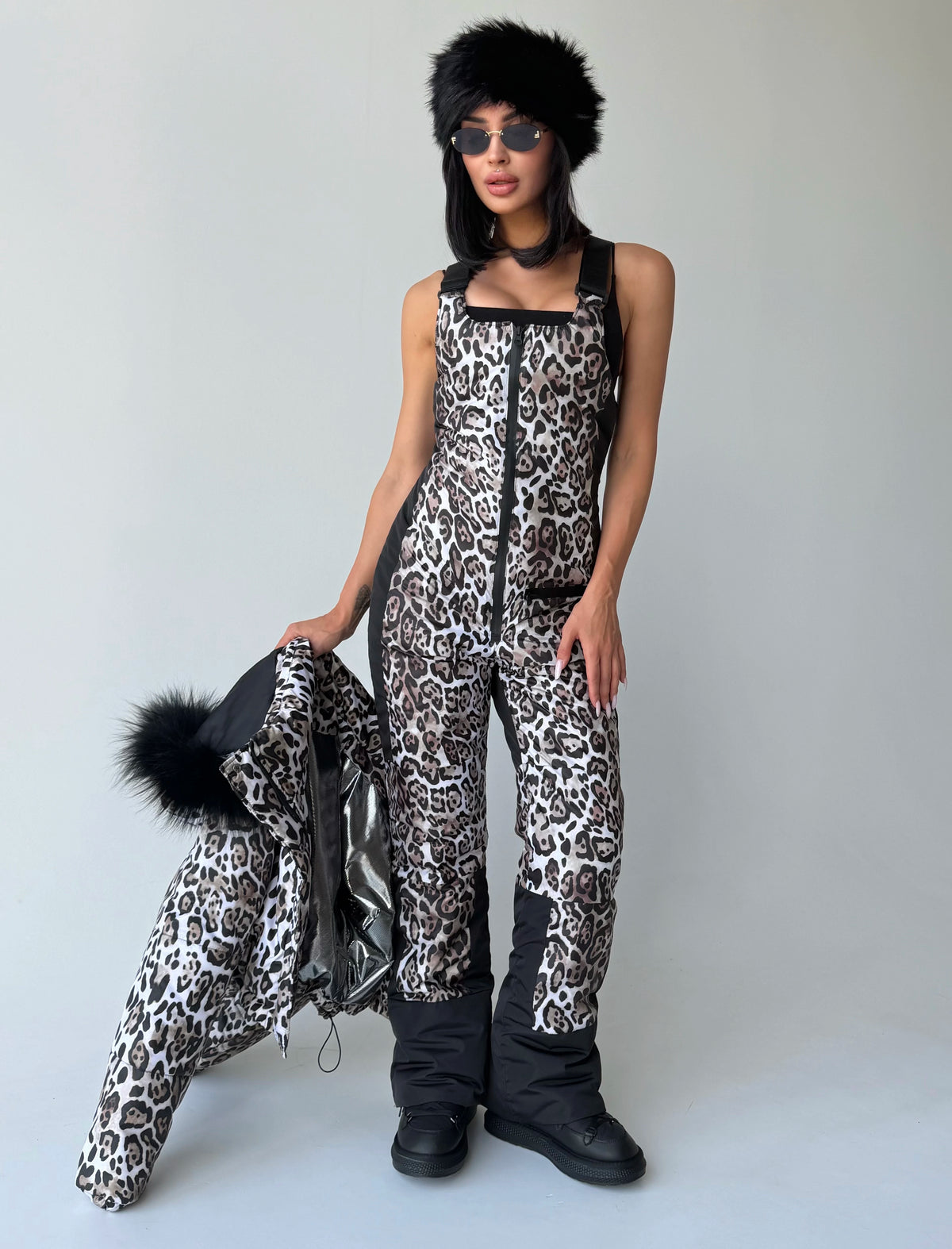 Women’s leopard ski bib overalls styled separately with a black top