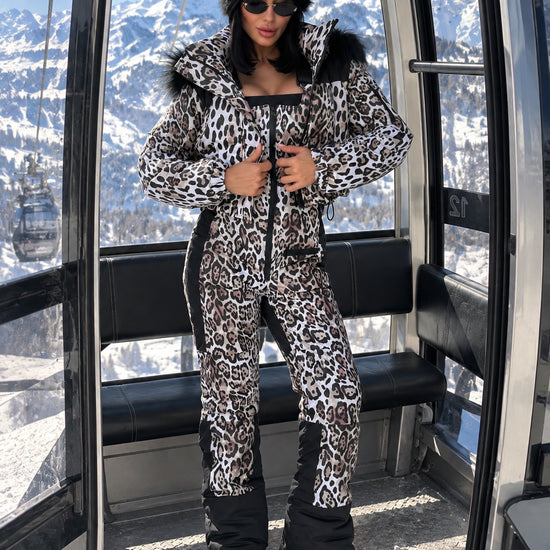 Full-length view of KRUTYAKOV women’s leopard ski suit NAIROBI