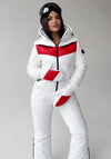 Front view of white glossy women’s ski jumpsuit with red accents