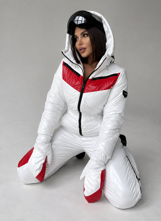 Women’s white one-piece ski suit with red panels and matching mittens