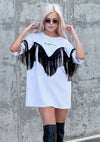 Front view of Ankora white fringe T-shirt styled as an everyday streetwear outfit with sunglasses and relaxed fit
