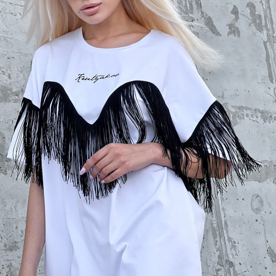 Back view of Ankora white designer T-shirt highlighting the clean oversized cut and minimalist streetwear look
