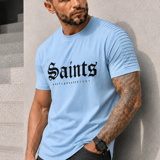 Men’s light blue SAINTS designer T-shirt by KRUTYAKOV with black velvet print and ribbed shoulder details
