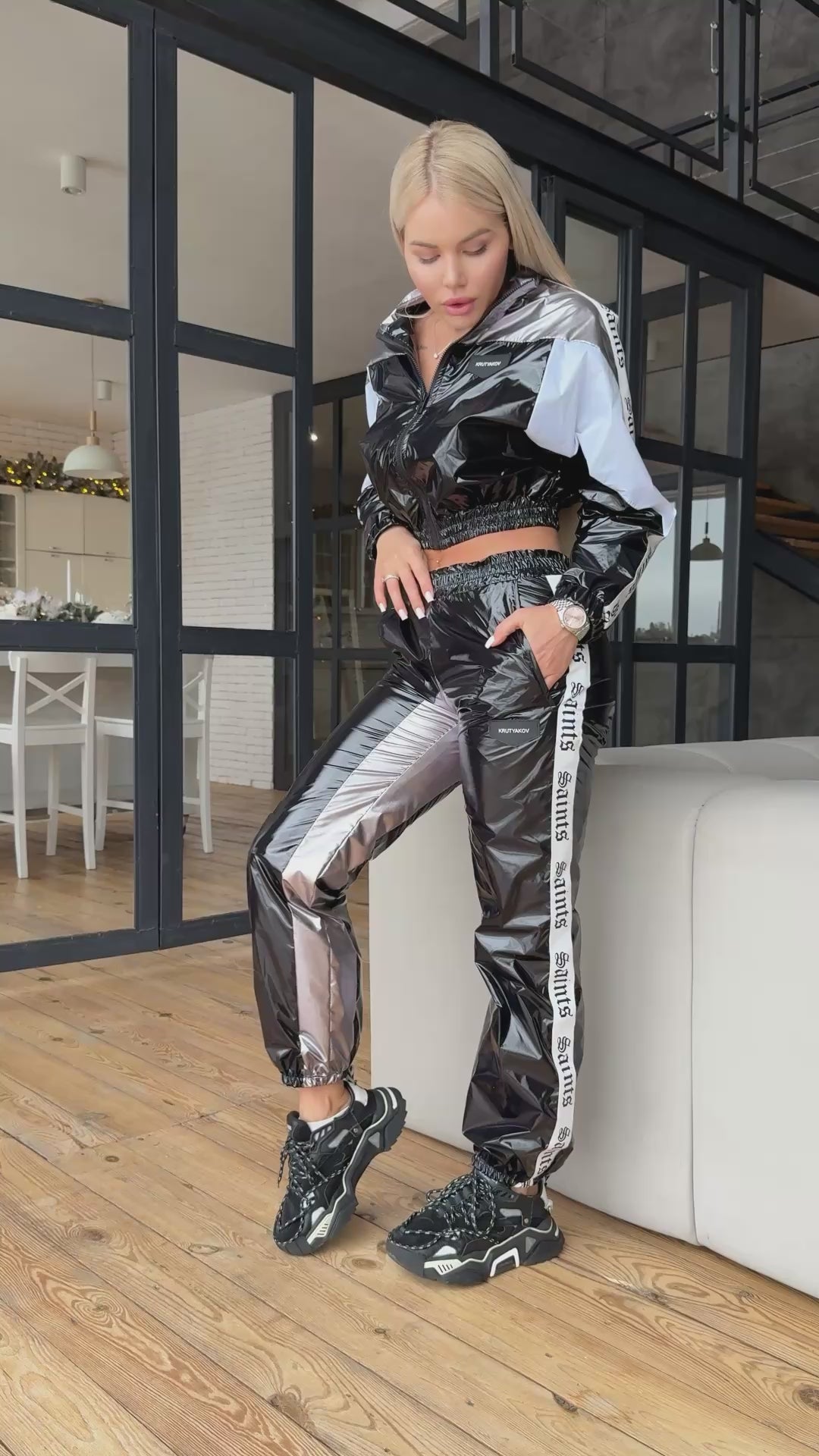 Black and silver women’s designer tracksuit for travel and city looks