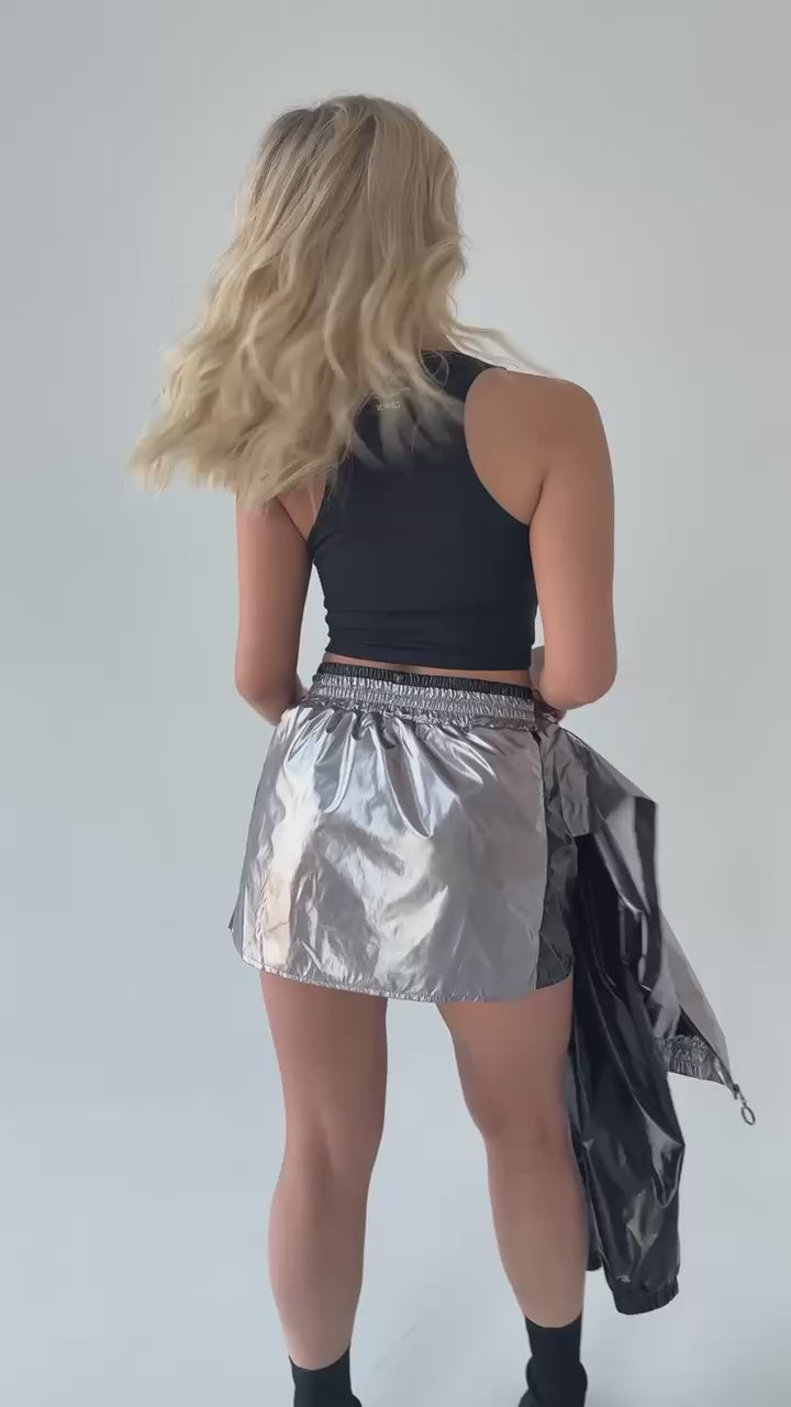 KRUTYAKOV shiny silver matching set for women with futuristic Y2K streetwear style