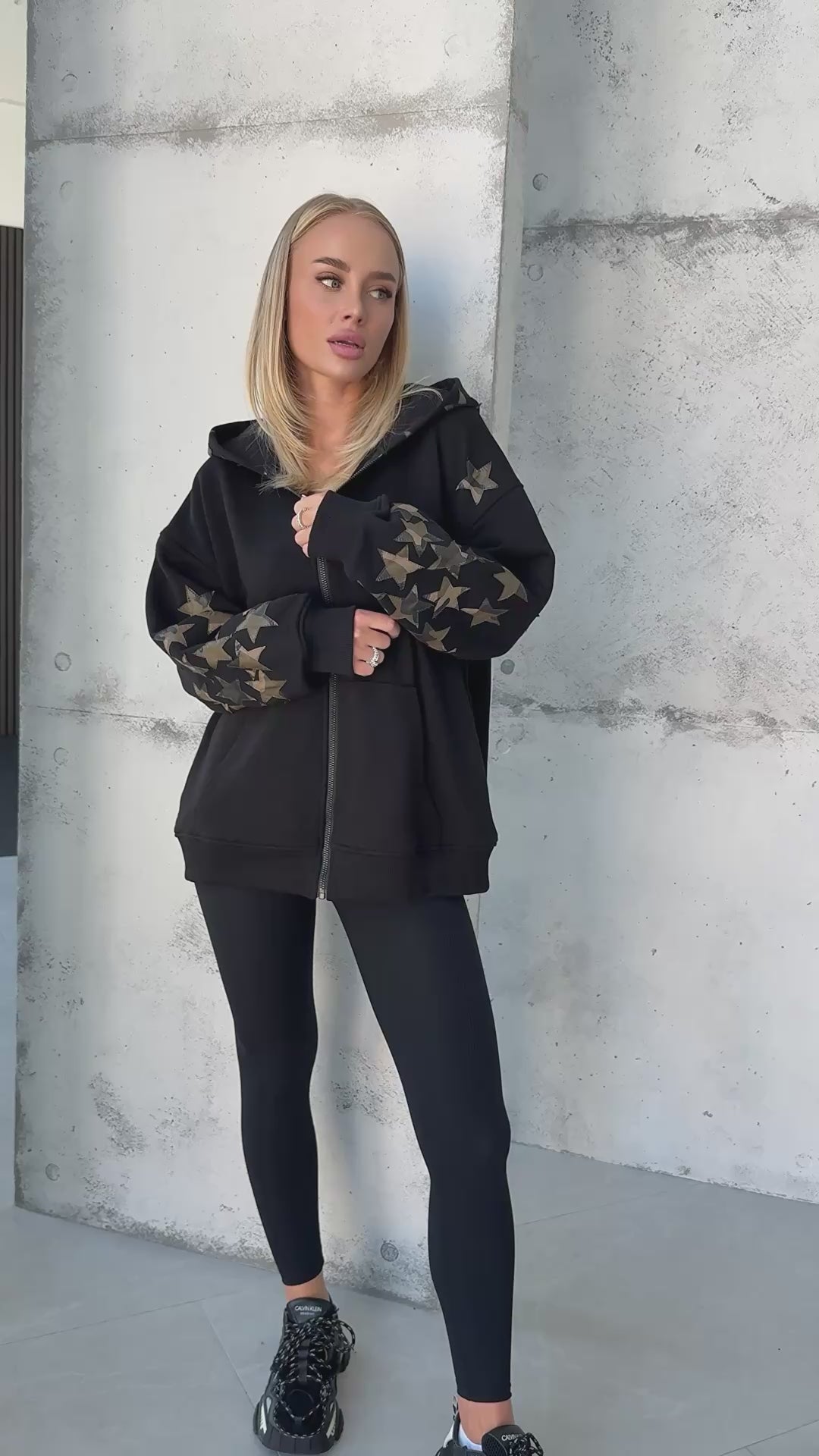KRUTYAKOV women’s black statement hoodie for casual travel and everyday wear